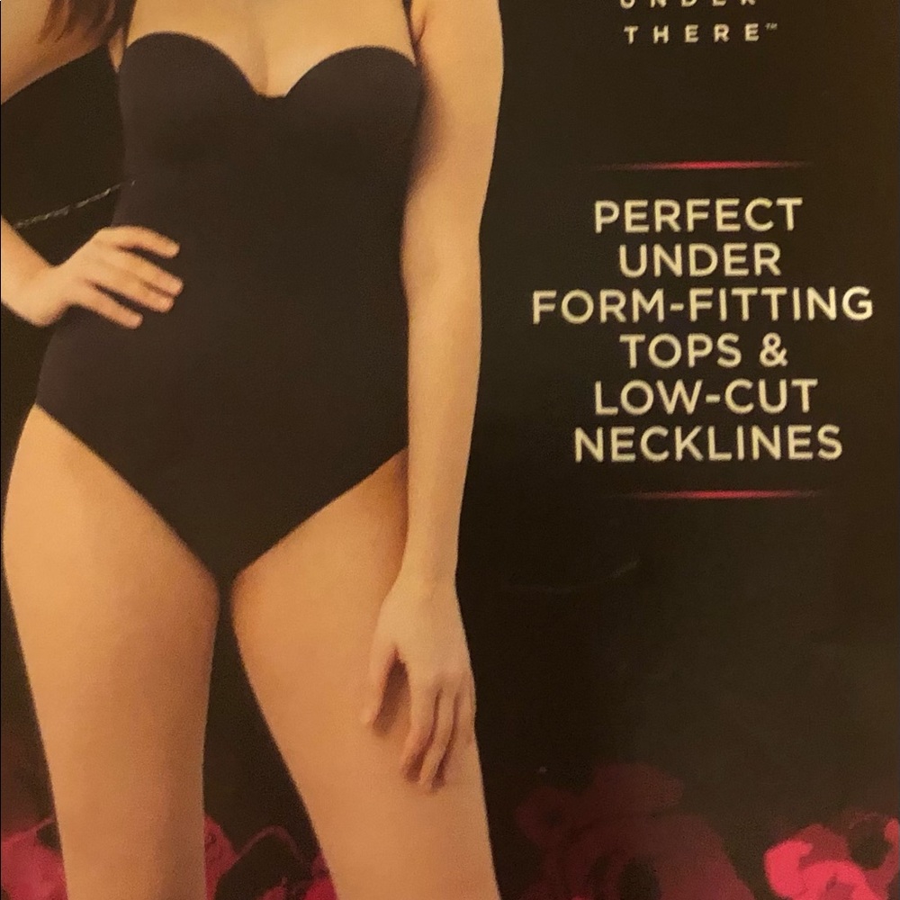 Brand New! Firm body shaper in nude size 34D. Great for low-cut necklines